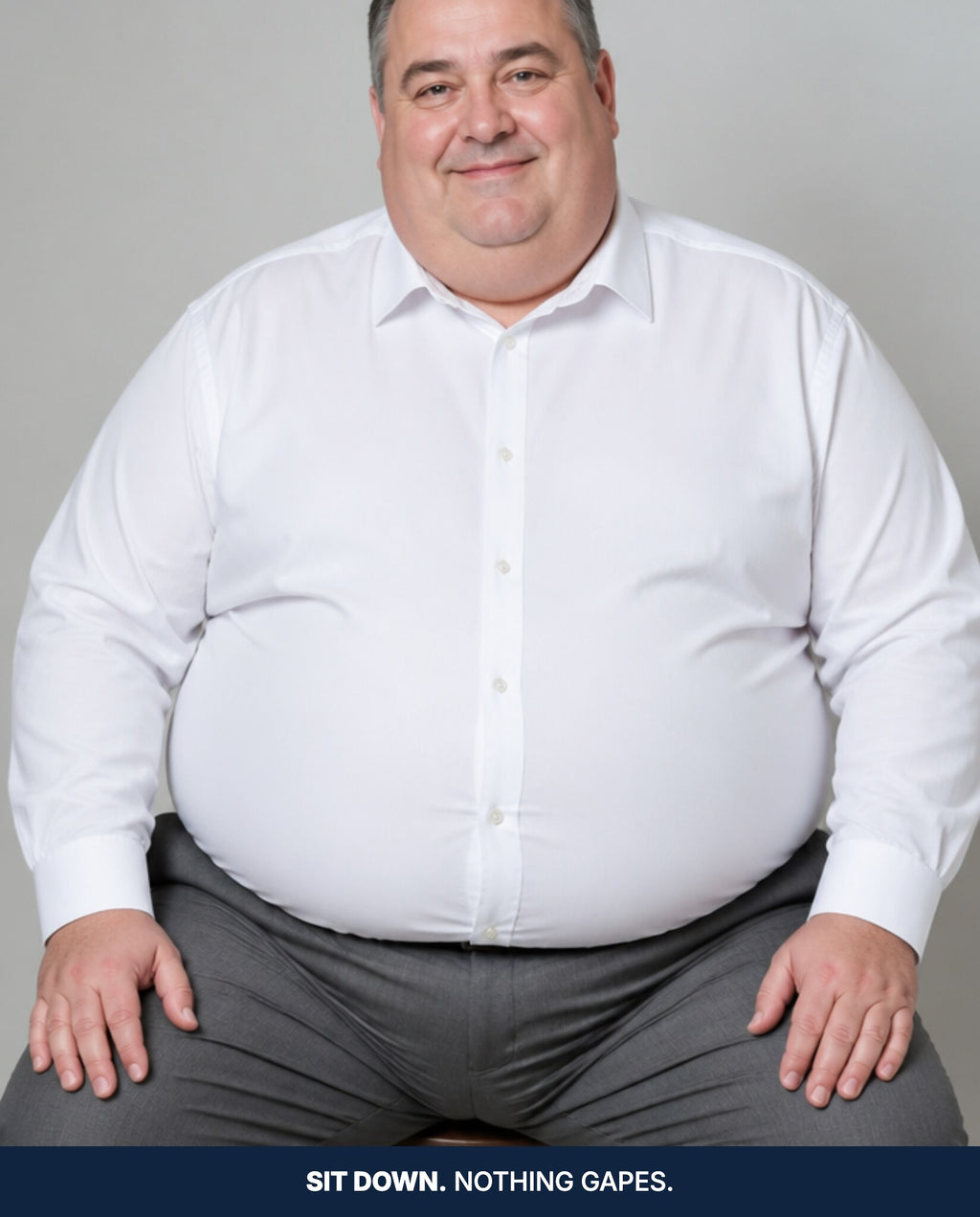 A large man seated, every button still lying flat with no gaping across the belly