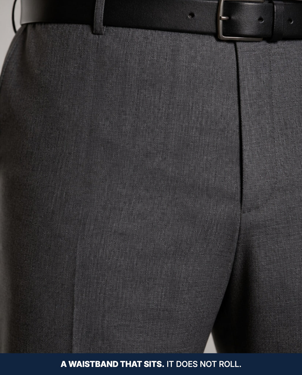 Close-up of the waistband sitting flat and level with no rolling