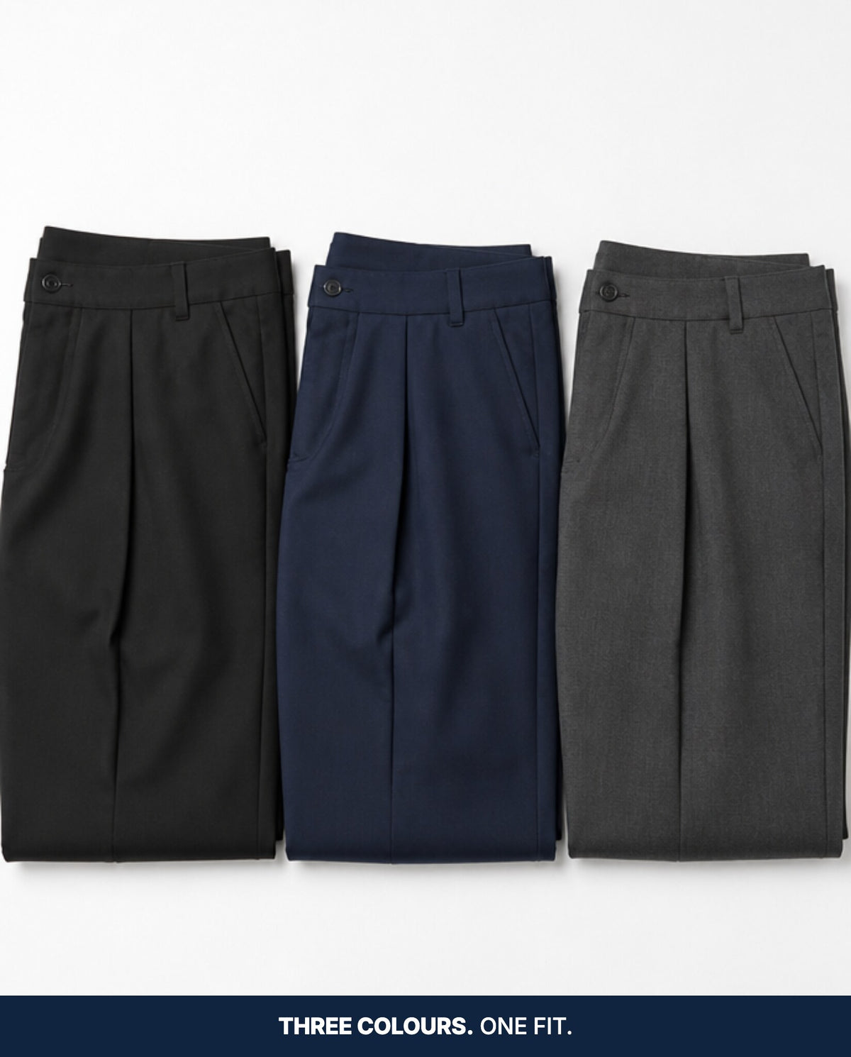 The Big Boy's Trousers folded in black, navy and charcoal grey